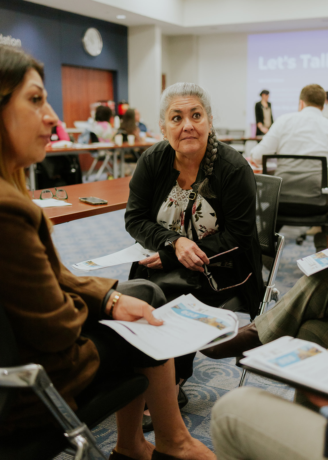 A nonprofit professional listening intently during a Connection Circle conversation